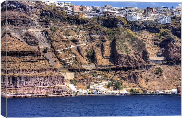 Cliffs of Santorini Canvas Print by Tom Gomez