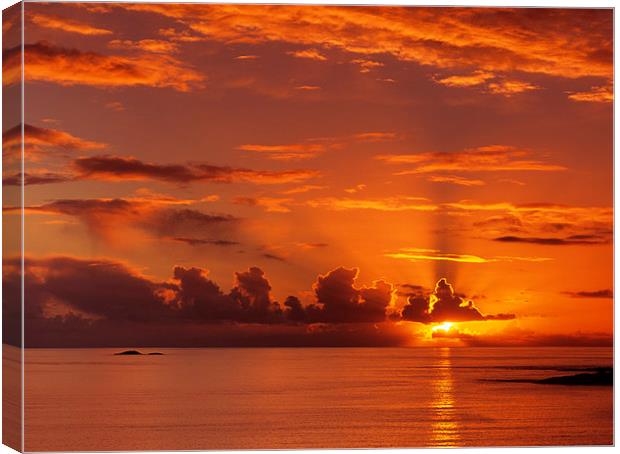 Stunning Red Sunset over the Sea Canvas Print by Pearl Bucknall