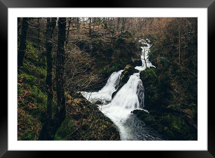 Colwith Force waterfall during heavy rain. Framed Mounted Print by Liam Grant