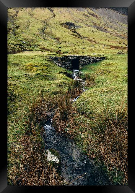 Drystone road bridge along in the Honister Pass. Framed Print by Liam Grant