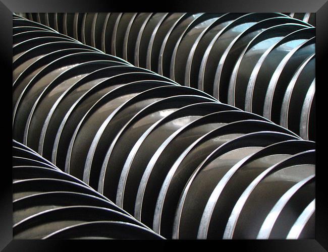 A stack of Steel Plates Framed Print by Susmita Mishra