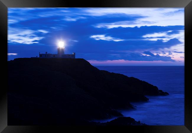 Strumble Head Lighthouse at dusk Framed Print by Ian Middleton