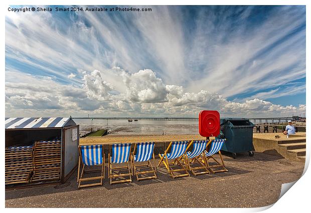Six empty deckchairs at Southend Print by Sheila Smart