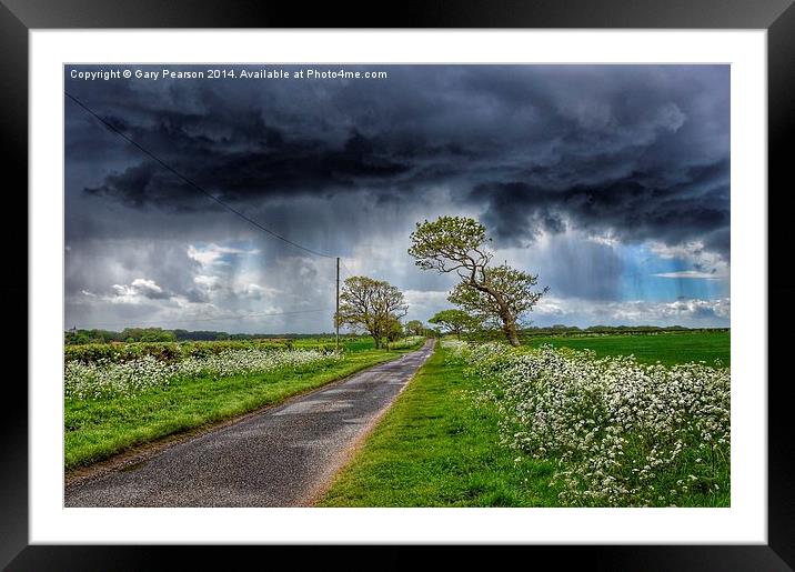Storm clouds over Ringstead Framed Mounted Print by Gary Pearson