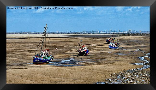 A row of small boats beached awaiting the incoming Framed Print by Frank Irwin
