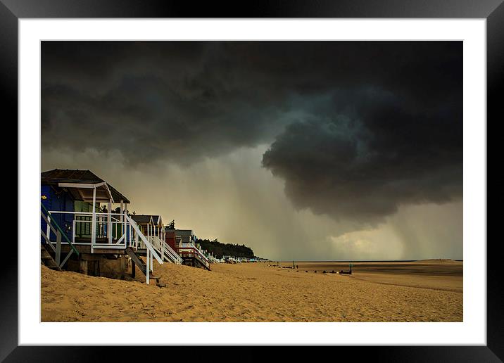 Storm over Wells beach huts Framed Mounted Print by Mark Bunning