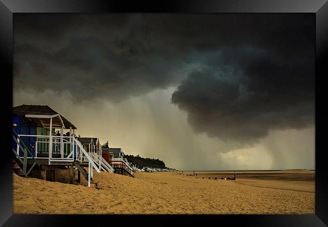 Storm over Wells beach huts Framed Print by Mark Bunning