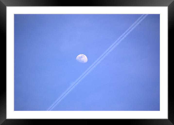 Moon and Contrails Framed Mounted Print by June Cerrezuela