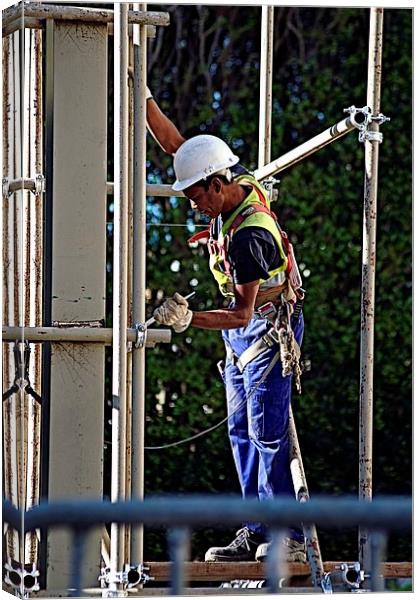 Worker in a scaffold 1 Canvas Print by Jose Manuel Espigares Garc
