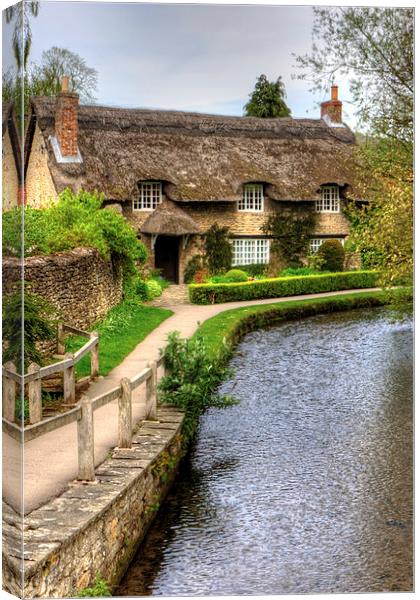 The Thatched Cottage Canvas Print by Tom Gomez