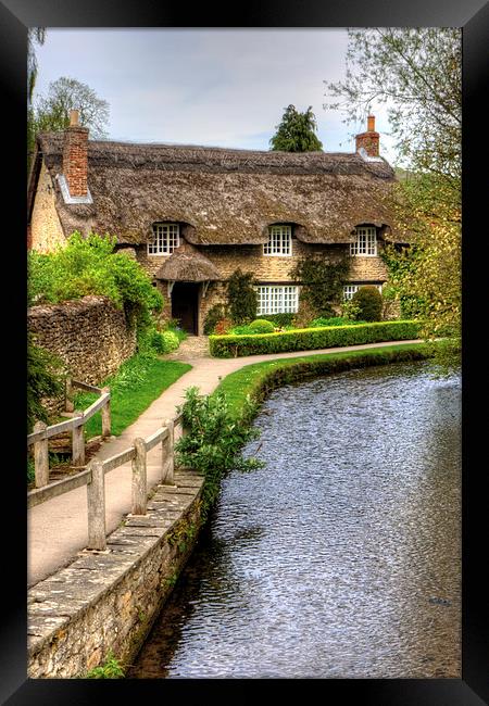 The Thatched Cottage Framed Print by Tom Gomez