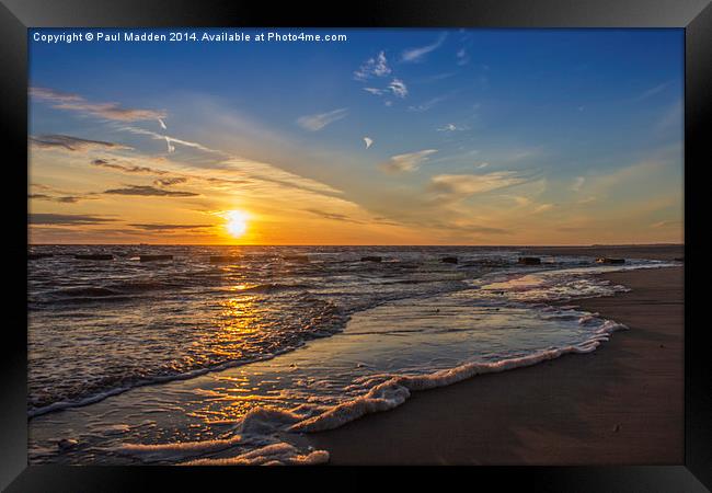 Sunset over the sea Framed Print by Paul Madden