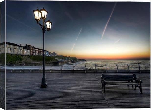 Sunset bench Cromer pier Canvas Print by Gary Pearson