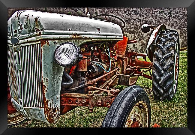 Old Rusty Tractor Framed Print by Tom and Dawn Gari