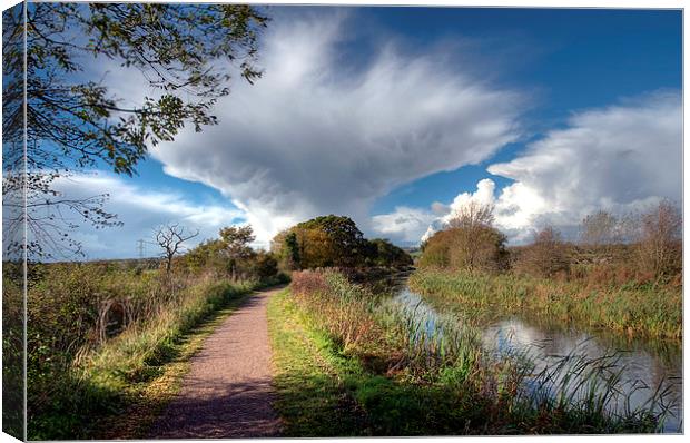 Rain clouds over the Grand Western Canal Canvas Print by Rosie Spooner
