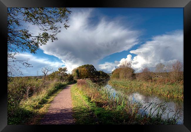 Rain clouds over the Grand Western Canal Framed Print by Rosie Spooner