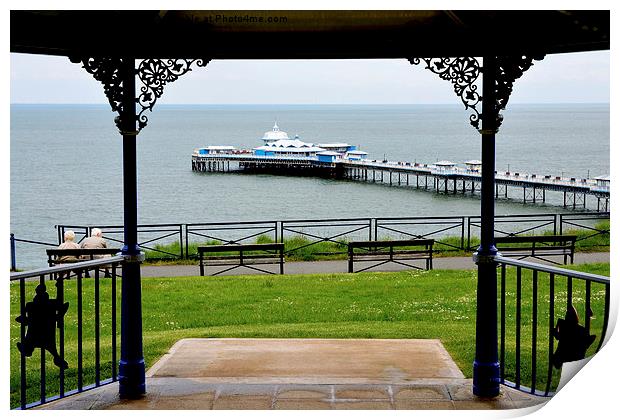 Picture of Llandudno Pier through the bandstand Print by Frank Irwin
