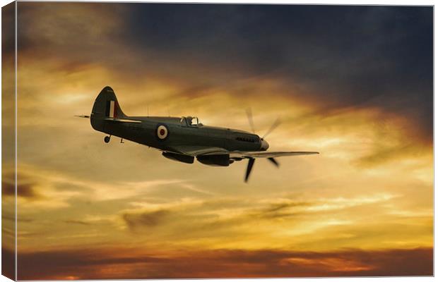 Spitfire  PS915 Sunset Canvas Print by J Biggadike