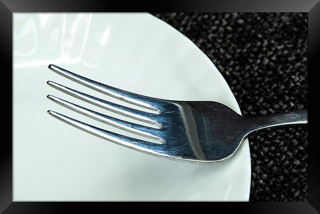 Fork on a plate Framed Print by David Pacey