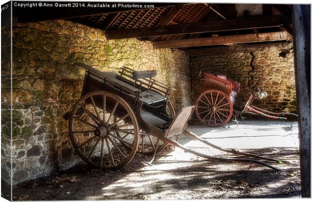 Old Barn and Horse Carriages Canvas Print by Ann Garrett