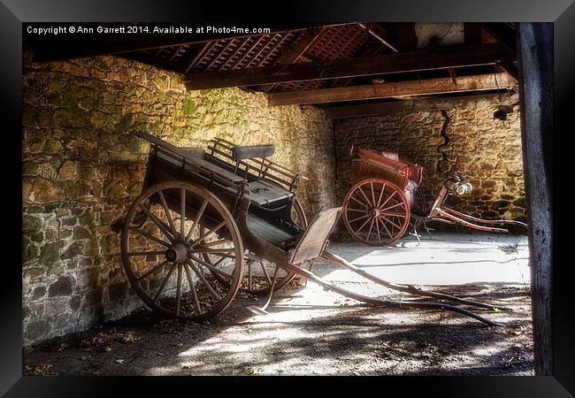 Old Barn and Horse Carriages Framed Print by Ann Garrett