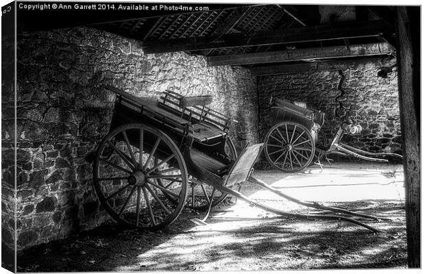 Old Barn and Horse Carriages Monochrome Canvas Print by Ann Garrett