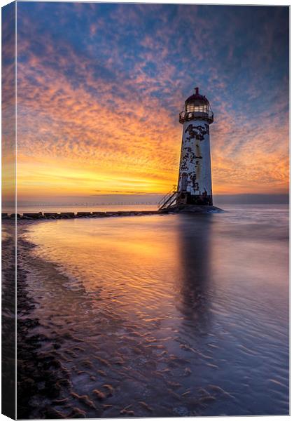 Sunset at the Lighthouse Canvas Print by Ian Mitchell