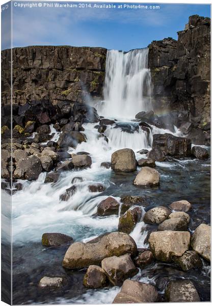 Waterfall at Thingvellir National Park Canvas Print by Phil Wareham