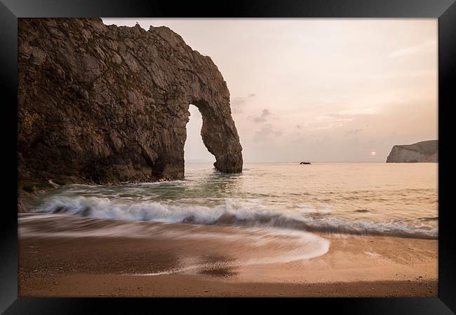 Sunset at Durdle Door Framed Print by Ian Middleton