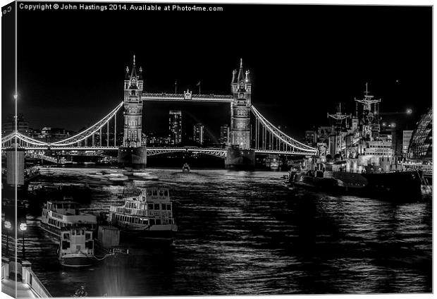 London's Iconic Bridge and Warship Canvas Print by John Hastings