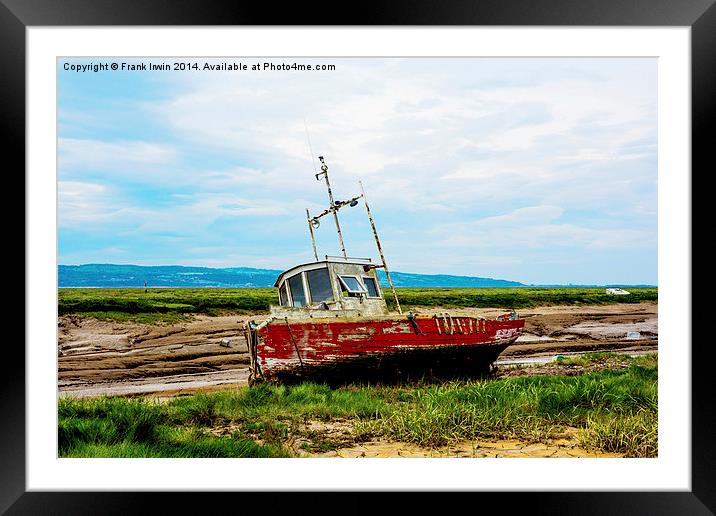 An abandoned and worse for wear boat Framed Mounted Print by Frank Irwin