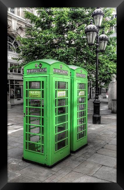 Green telephone boxes Framed Print by Andy Huntley