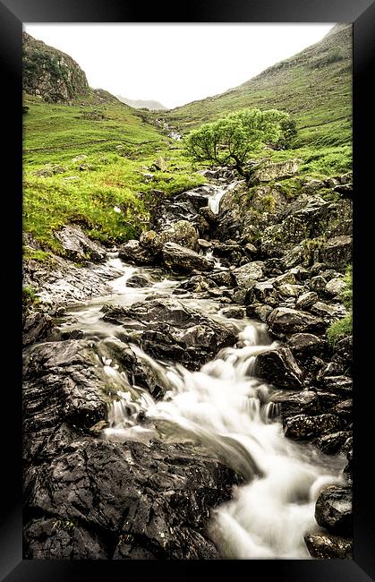 Like water on rock Framed Print by Andrew Tait