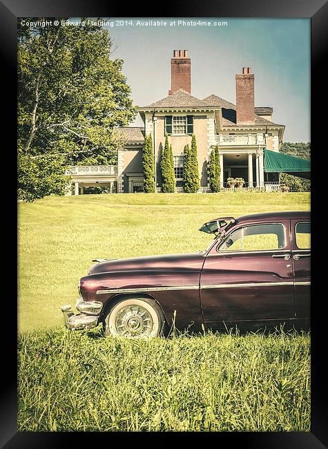 Old classic car in front of large mansion Framed Print by Edward Fielding