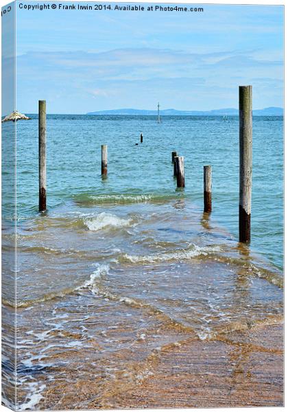 Rhos-on-Sea jetty with the tide in Canvas Print by Frank Irwin