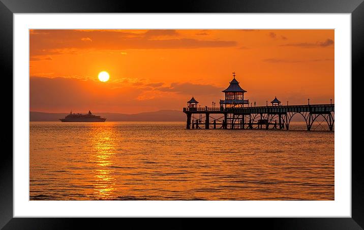 Sun setting at Clevedon Pier. Framed Mounted Print by Dean Merry