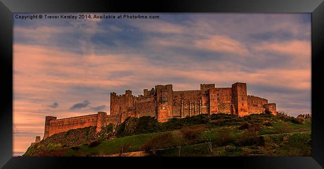 Bamburgh Castle Framed Print by Trevor Kersley RIP
