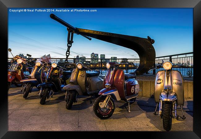 Scooters and the City Framed Print by Neal P