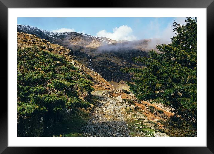 Mountain footpath and distant waterfall near Conis Framed Mounted Print by Liam Grant