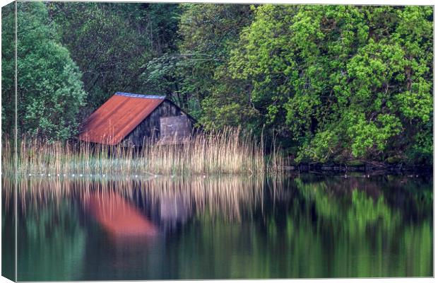 Old Boathouse on Loch Canvas Print by Adrian Hargan