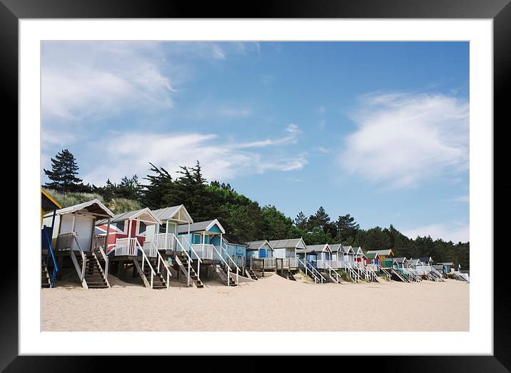 Beach huts at Wells-next-the-sea. Norfolk, UK. Framed Mounted Print by Liam Grant