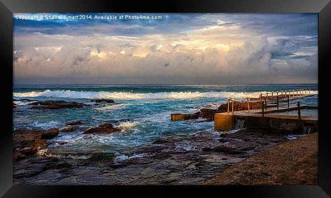 Avalon rockpool with approaching storm Framed Print by Sheila Smart