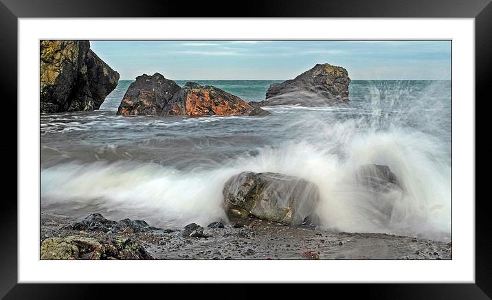 Waves against the rocks Framed Mounted Print by Derek Dobbie