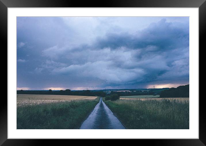 Evening thunder storm and clouds over rural scene. Framed Mounted Print by Liam Grant