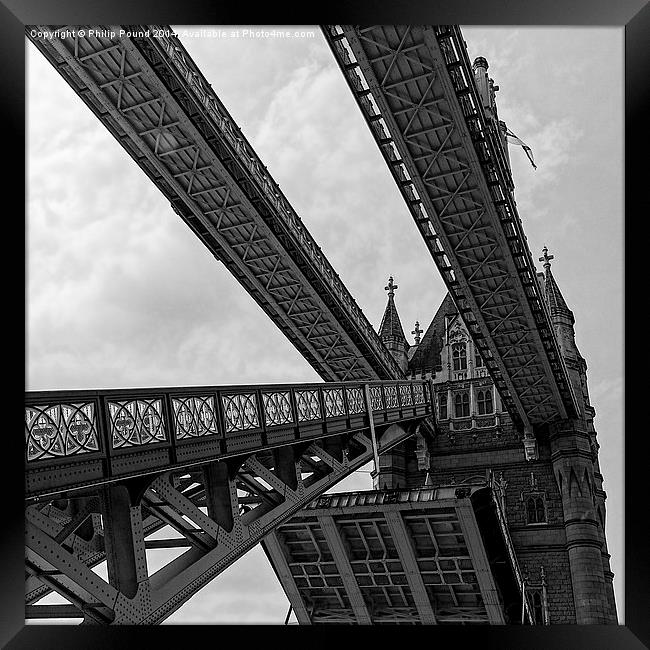 Tower Bridge - the drawbridge opens. Framed Print by Philip Pound