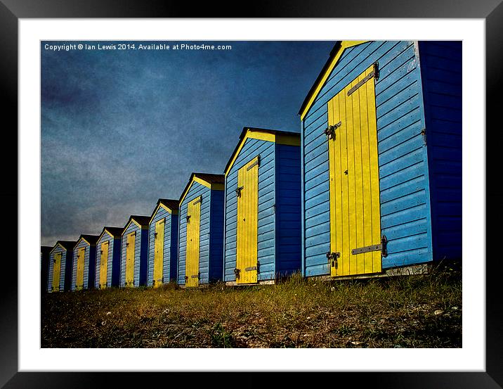  Blue and Yellow Beach Huts Framed Mounted Print by Ian Lewis