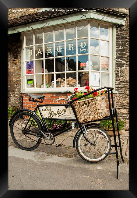  Baker's bike. Framed Print by John Morgan