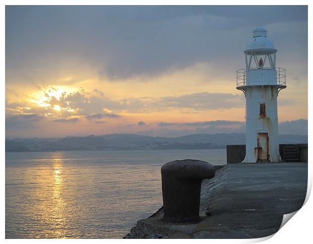  Brixham lighthouse by sunset Print by Ann Biddlecombe