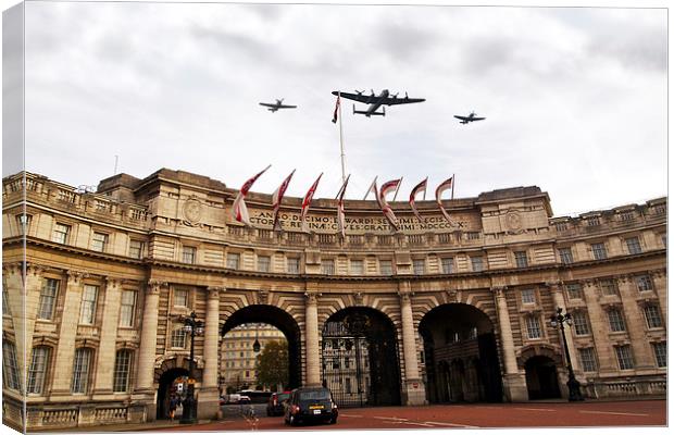 Over Admiralty Arch  Canvas Print by J Biggadike