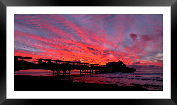  Silhouette pier. Framed Mounted Print by paul cobb